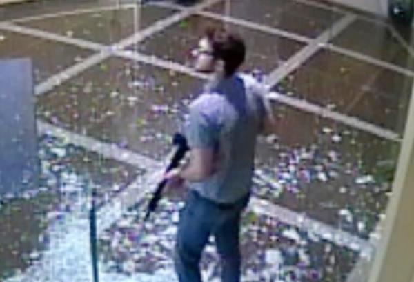 FILE - This image taken from surveillance video provided by the Louisville Metro Police Department shows bank employee Co<em></em>nnor Sturgeon, 25, carrying an AR-15 assault-style rifle after opening fire at Old Natio<em></em>nal Bank, in Louisville, Ky., Monday, April 10, 2023. Sturgeon, a man who opened fire at a Louisville bank, killing five co-workers, had co<em></em>nfronted mental health problems over the last year and the situation appeared to be managed until just days before the shooting, his mother said. (Courtesy of Louisville Metro Police Department via AP, File)